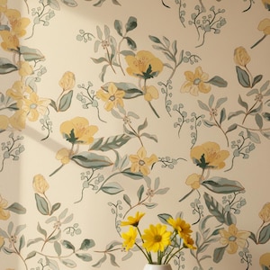 May include: A wallpaper pattern featuring yellow flowers and sage green leaves on a cream background. The design includes various floral clusters and stems arranged in a repeating motif. A small vase with fresh yellow flowers sits at the bottom.