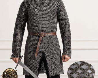May include: A long-sleeved chainmail hauberk constructed from interlocking dark metal rings, featuring a round neckline and a straight hem. A brown leather belt with a simple knot closure is worn around the waist over the metallic armor.