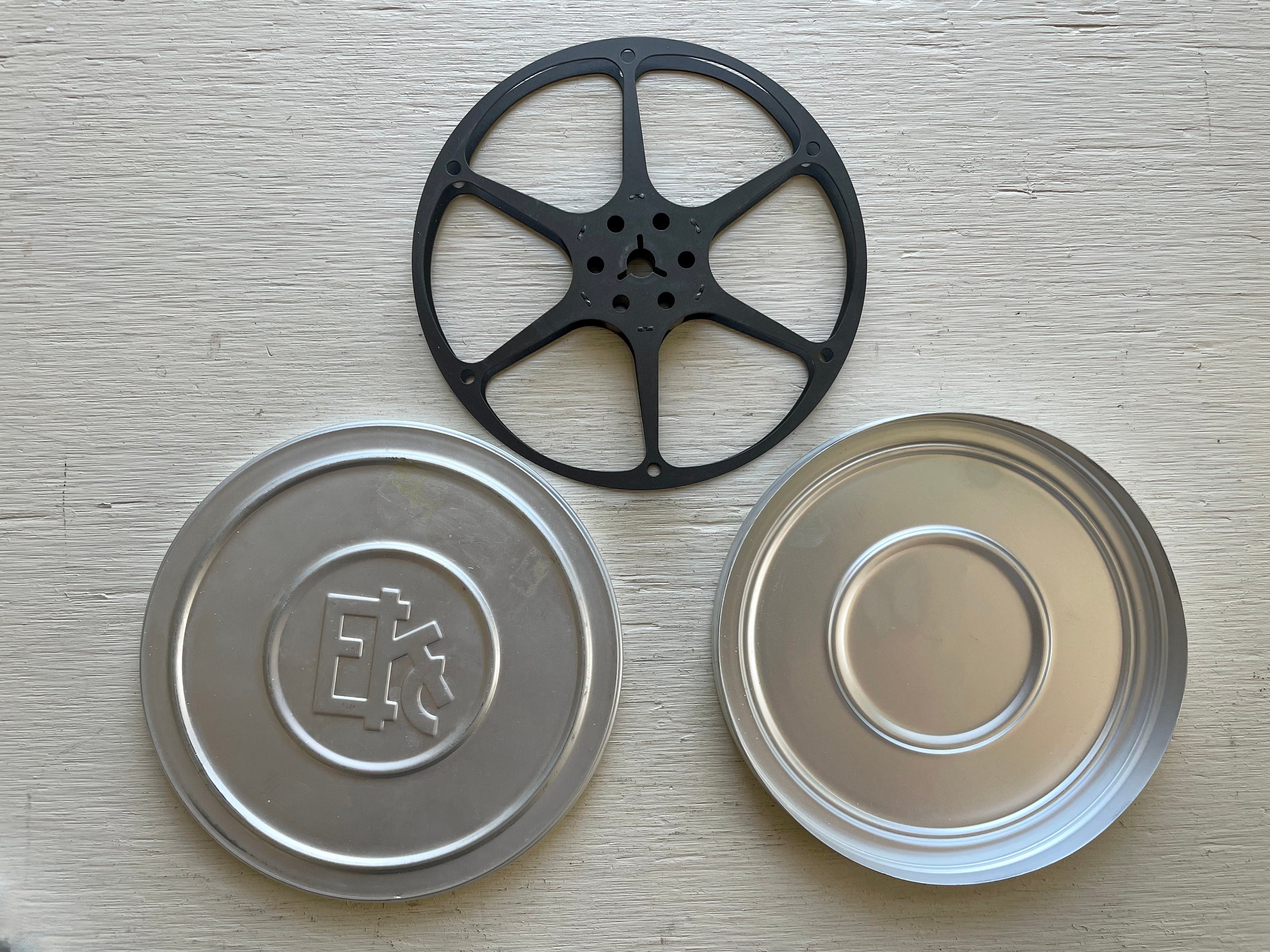 Vintagefilm Reel 5 Silver EKC Film Canister and Black Bell and Howell Reel  