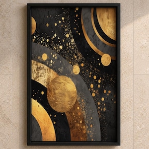Op de afbeelding: Een rechthoekig ingelijst kunstwerk aan de muur met een abstracte compositie van zwarte gebogen banden en getextureerde gouden cirkels. Het ontwerp bevat een verspreid patroon van kleine gouden stippen en spetters tegen een matzwarte achtergrond.