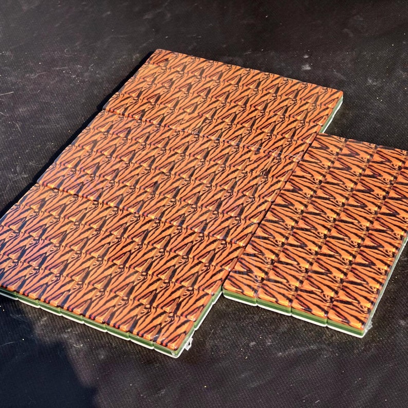 Tiger Mahjong tile set with tiger stripe backs, safari themed Mahjong tiles, custom American Mahjong set, jungle inspired Mahjong game, luxury Mahjong tiles, wildlife Mahjong collection, animal print Mahjong set, premium Mahjong tiles, collector Mahjong gift, exotic Mahjong design, tiger pattern game tiles, custom Mahjong accessories, unique Mahjong set