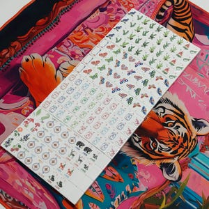 Nature inspired American Mahjong tile set with woodland illustrations, butterfly dot tiles, pine branch bam tiles, firefly mason jar craks, mushroom flower tiles, compass wind tiles, whimsical forest Mahjong set, cottagecore Mahjong tiles, collectible Mahjong game set, luxury Mahjong tiles, aesthetic board game décor, botanical Mahjong collection, artistic Mahjong gift for nature lovers and cozy game nights