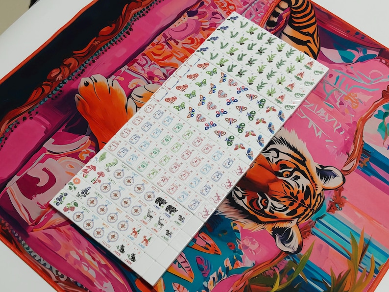 Nature inspired American Mahjong tile set with woodland illustrations, butterfly dot tiles, pine branch bam tiles, firefly mason jar craks, mushroom flower tiles, compass wind tiles, whimsical forest Mahjong set, cottagecore Mahjong tiles, collectible Mahjong game set, luxury Mahjong tiles, aesthetic board game décor, botanical Mahjong collection, artistic Mahjong gift for nature lovers and cozy game nights