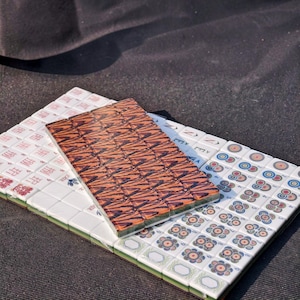 Tiger Mahjong tile set with tiger stripe backs, safari themed Mahjong tiles, custom American Mahjong set, jungle inspired Mahjong game, luxury Mahjong tiles, wildlife Mahjong collection, animal print Mahjong set, premium Mahjong tiles, collector Mahjong gift, exotic Mahjong design, tiger pattern game tiles, custom Mahjong accessories, unique Mahjong set