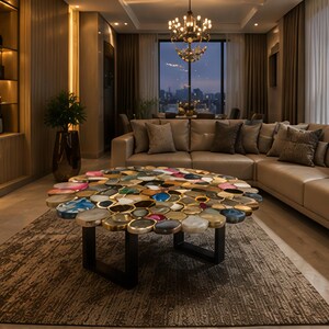 May include: A luxurious living room with a large, round coffee table featuring a mosaic of colorful stones. A beige sectional sofa with throw pillows sits on a patterned rug. The room has a warm, inviting ambiance with soft lighting and a city view.