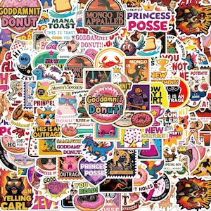 May include: A collection of colorful vinyl stickers featuring various graphic designs, including cartoon dinosaurs, cats, donuts, and text such as Goddamnit Donut, Princess Posse, and Mongo Is Appalled, arranged in a dense, overlapping collage.