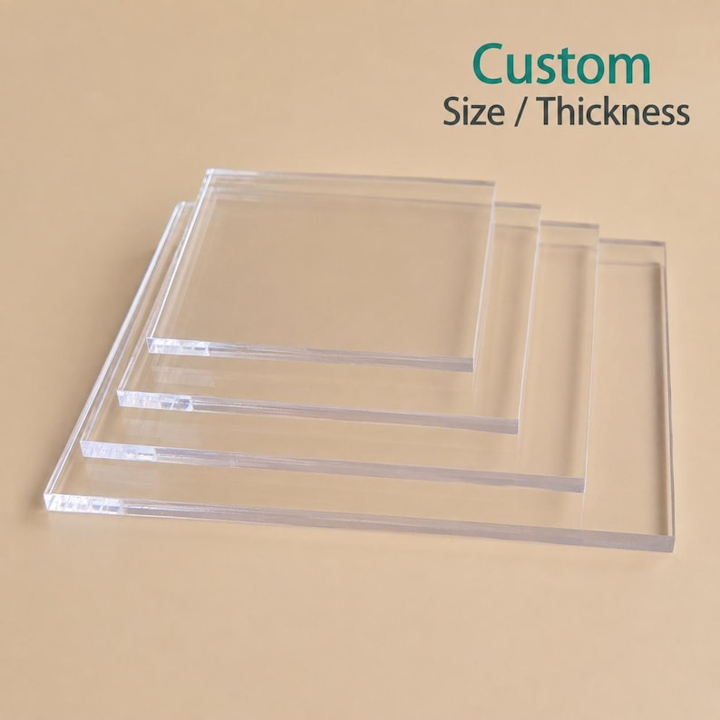 May include: Clear acrylic sheets of varying sizes and thicknesses are stacked on a neutral background. The text "Custom Size / Thickness" is in the upper right corner. The sheets are transparent and appear to be square or rectangular.