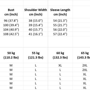 May include: A white size chart and size reference matrix table with black text. The chart lists garment measurements in cm and inches for sizes M, L, XL, and 2XL, including length, bust, shoulder width, and sleeve length, plus height and weight.