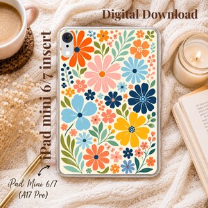 May include: A clear tablet case featuring a vibrant floral pattern with orange, pink, light blue, dark blue, and yellow flowers on a cream background. The text Digital Download and iPad mini 6/7 insert are visible on the product image.