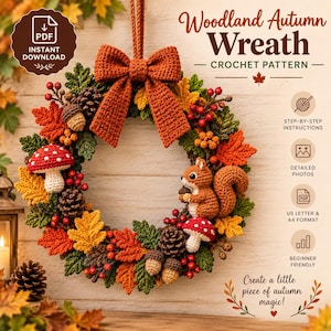 May include: A crochet pattern for a Woodland Autumn Wreath featuring a large orange bow, red and yellow maple leaves, brown pinecones, acorns, red berries, two red and white spotted mushrooms, and a brown squirrel holding an acorn.