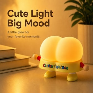 May include: A yellow and orange cartoon-style lamp with the text "Crayon Shinchan". The lamp has two round light bulbs and small arms and legs. The text "Cute Light Big Mood" is also visible.