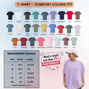 May include: A Comfort Colors 1717 t-shirt color chart displaying twenty-three solid color options including black, white, pepper, seafoam, blue jean, violet, navy, red, espresso, ice blue, ivory, spruce, moss, mustard, flo blue, watermelon, green, orchid, yam, crimson, denim, crunchberry, blossom, chambray, berry, and bay, with a size measurement chart in inches.