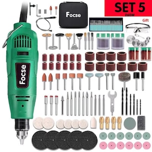 May include: A green rotary tool kit with the brand name "Focse" on the tool. The kit includes various attachments, a black carrying case, and safety glasses. The text "SET 5 260W" is visible in the image.