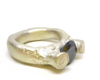 Sterling silver and black moissanite ring.
