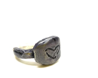 Handcrafted silver signet ring with a rustic, organic vibe. Love ring