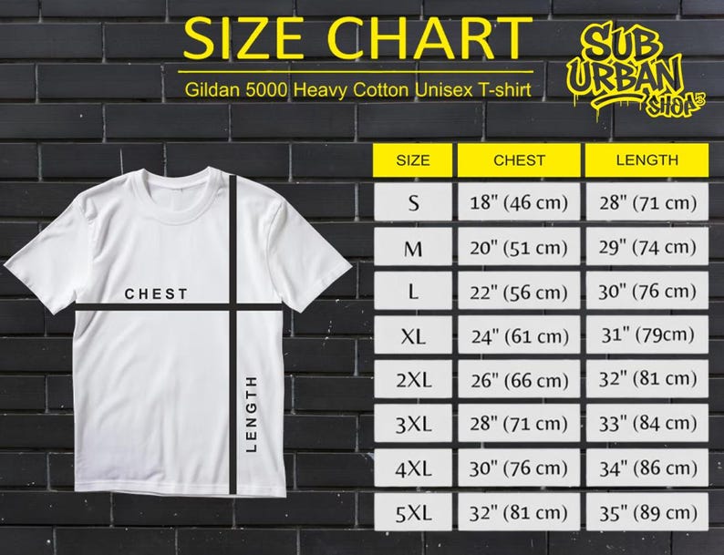 May include: A white Gildan 5000 Heavy Cotton Unisex T-shirt with a size chart. The chart lists chest and length measurements in inches and centimeters for sizes S through 5XL. The shirt is displayed against a black brick wall.
