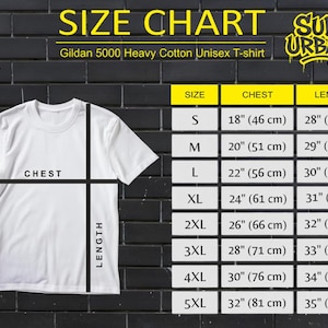 May include: A white Gildan 5000 Heavy Cotton Unisex T-shirt with a size chart. The chart lists chest and length measurements in inches and centimeters for sizes S through 5XL. The shirt is displayed against a black brick wall.