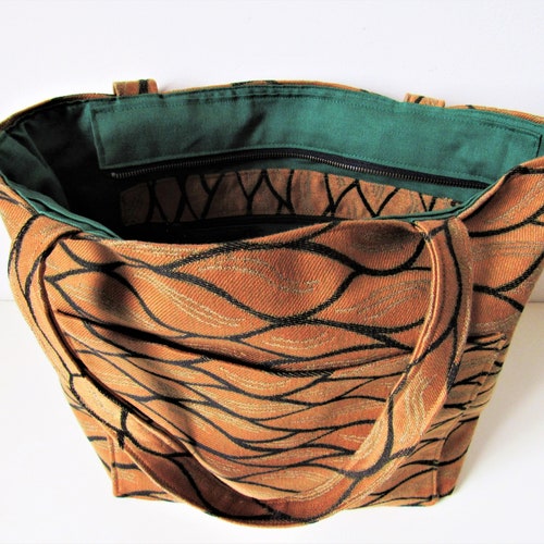 Orange fabric bag shops