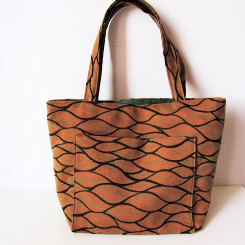 Orange fabric bag shops