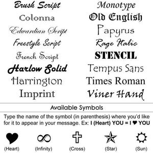 May include: A chart displaying available font styles including Arial, Bauhaus, Brush Script, Colonna, Edwardian Script, Freestyle Script, French Script, Harlow Solid, Harrington, Imprint, Magneto, Modern, Monotype, Old English, Papyrus, Rage Italic, STENCIL, Tempus Sans, Times Roman, and Viner Hand. Below are available symbols: Heart, Infinity, Cross, Star, Sun, Peace, Ying-Yang, Star of David, Smily-Face, and Key.