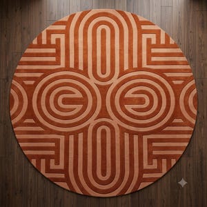 May include: A circular area rug featuring a geometric pattern of concentric circles and straight lines in alternating shades of burnt orange and light peach. The design creates a symmetrical, repeating motif across the entire surface of the rug.