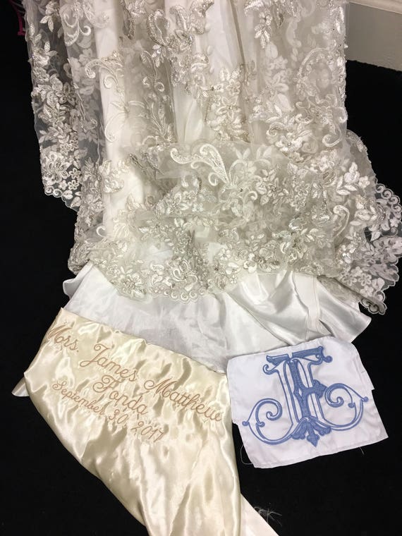 Wedding dress label name of groom and bride sew it in the inside of the wedding dress something blue