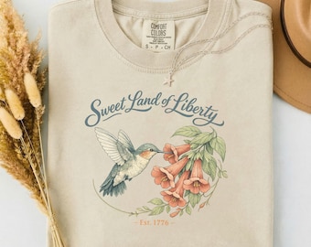 ハミングバード スウィートランドオブリバティシャツ、コテージコアTシャツ、1776年創業の気まぐれなアメリカ、アメリカ合衆国建国250周年、セミクインセンテニアル