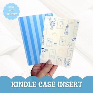 May include: Kindle case inserts with a nautical theme. One insert has blue stripes, the other has a cream background with blue illustrations of a lobster, lighthouse, and other sea elements. Text on the image reads "CASE NOT INCLUDED" and "KINDLE CASE INSERT."