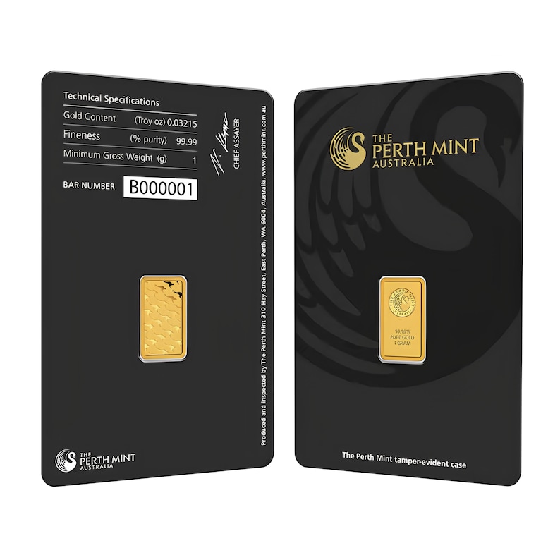 May include: A 1 gram gold bar from The Perth Mint, Australia, encased in a black tamper-evident card. The front displays the mint logo and gold purity, while the back lists technical specifications including 0.03215 troy oz and bar number B000001.