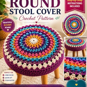May include: A handmade round stool cover crochet pattern. The cover features a vibrant, colorful design with a central white flower pattern, surrounded by rings of blue, orange, pink, and purple. The stool has wooden legs and a deep purple base.