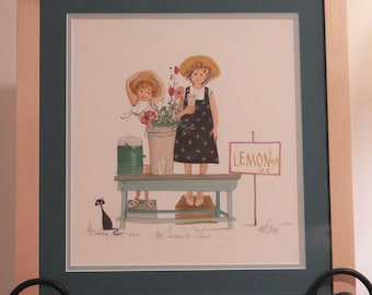 "P. Buckley Moss Kunstdruck ""Lemonade Sisters"" in signiertem und nummeriertem, handgefertigtem Ahornholzrahmen."