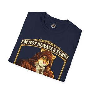 May include: Navy blue t-shirt with a graphic of a lion-like character wearing glasses and a suit. The text "I'M NOT ALWAYS A FURRY" is displayed above the character in a gold-colored frame.