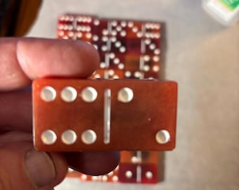 Hand made red and purple mixed resin dominoes.
