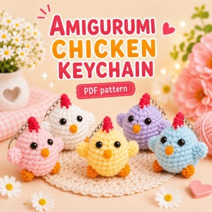 May include: A collection of five crocheted chicken keychains in various colors: pink, white, yellow, purple, and blue. Each chicken has a red comb, orange beak, and black eyes. The text "Amigurumi Chicken Keychain" is displayed above the keychains.