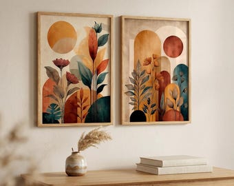Könnte beinhalten: Zwei gerahmte Wandbilder mit abstrakten botanischen Illustrationen von Blumen und Blättern in Orange-, Petrol- und Cremetönen. Die Kunstwerke integrieren geometrische Formen wie Kreise und Bögen und sind im Hochformat dargestellt.