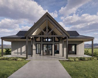 May include: A modern, single-story house with a gabled roof and a covered porch. The exterior features light gray siding, dark trim, and large windows. The house is set against a backdrop of green grass, mountains, and a cloudy sky.