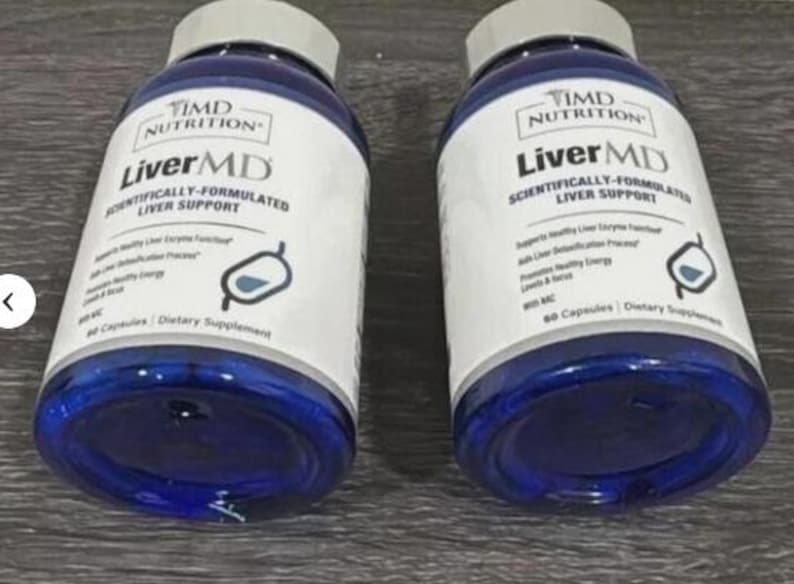 May include: Two blue bottles of LiverMD dietary supplement. Each bottle has a white label with black text, including the brand name, product name, and a graphic. The bottles have grey caps and contain 60 capsules.
