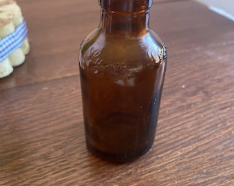 Vintage LYSOL bärnstensfärgad glasflaska 10 cm hög