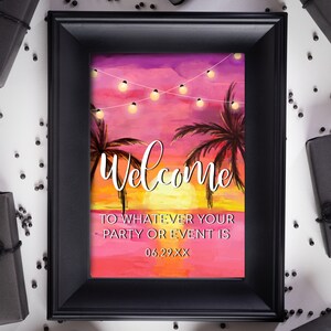 May include: A framed print with a sunset scene, palm trees, and string lights. The word "Welcome" is in elegant script, with the text "TO WHATEVER YOUR PARTY OR EVENT IS" and a date below.