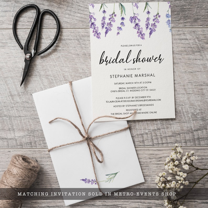 May include: A lavender-themed bridal shower invitation with watercolor illustrations of lavender flowers. The invitation includes the text "Please join us for a bridal shower in honor of Stephanie Marshal" and details about the event, including the date, time, location, RSVP information, and where to register gifts.