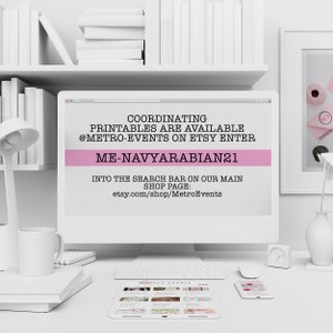 May include: A computer monitor displaying text that reads: COORDINATING PRINTABLES ARE AVAILABLE @METRO-EVENTS ON ETSY ENTER ME-NAVYARABIAN21 INTO THE SEARCH BAR ON OUR MAIN SHOP PAGE: etsy.com/shop/MetroEvents. The screen is set on a white desk with a tablet.