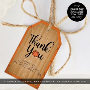 May include: A basketball-themed favor tag with a wood-grain court pattern, featuring the text Thank You and Thank you for showering me with your love. The tag is tied with natural jute twine and includes a small orange basketball graphic.