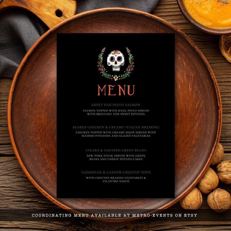 Day of the dead themed dinner menu a watercolor-style sugar skull with flower and leaf accents on a black background. Designed By MetroEvents