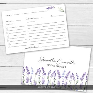 May include: Two white rectangular recipe cards featuring a watercolor lavender illustration. One card displays fields for recipe, servings, cook time, ingredients, and instructions. The other card reads Samantha Cromwell's BRIDAL SHOWER.