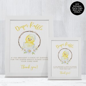 May include: Two white framed signs with text and illustrations for a baby shower. The signs read "Diaper Raffle" in gold script, with a watercolor chick illustration. The text below reads "If you brought a pack of diapers for the diaper raffle please leave your card here. Thank you!"