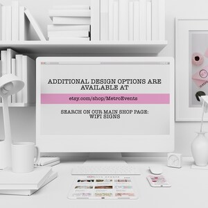 May include: A computer monitor displaying the text: ADDITIONAL DESIGN OPTIONS ARE AVAILABLE AT etsy.com/shop/MetroEvents SEARCH ON OUR MAIN SHOP PAGE: WIFI SIGNS. The screen features a horizontal pink bar across the center of the white background.