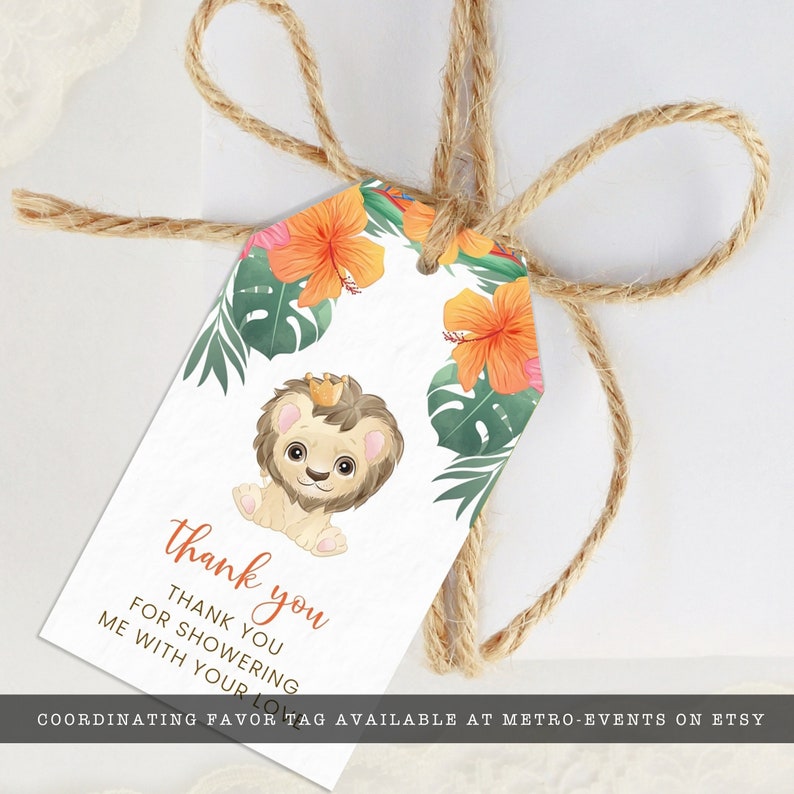 May include: A white gift tag with a watercolor illustration of a lion cub wearing a crown, surrounded by orange hibiscus flowers and green leaves. The tag reads "thank you" in orange script and is tied with twine.