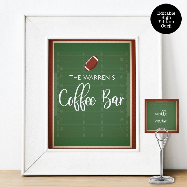 May include: A white framed sign featuring a green football field background with a brown football, the text THE WARREN'S Coffee Bar, and a smaller matching sign on a silver metal stand labeled vanilla creamer, with an editable sign notice.