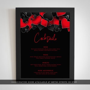May include: A black framed sign featuring a red and black playing card suit design at the top. The text reads Cocktails, Beer, Wine, Spirits, and Non-Alcoholic, followed by lists of various beverage types. The bottom text reads Coordinating signs available at metro-events on Etsy.