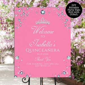 May include: Pink welcome sign with a silver crown and glitter for a Quincea&ntilde;era. The sign says "Welcome to Isabella's Quincea&ntilde;era 06.19.20XX Thank You for sharing this special day with us".